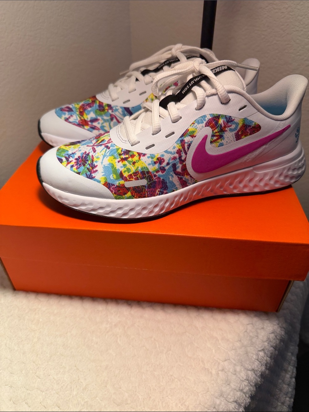 Nike Kids White Sneakers with Pink Swoosh & Multicolor Floral Print